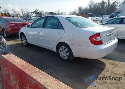 2002 Toyota Camry Le from USA, damaged, VIN 4T1BE32K22U063358
